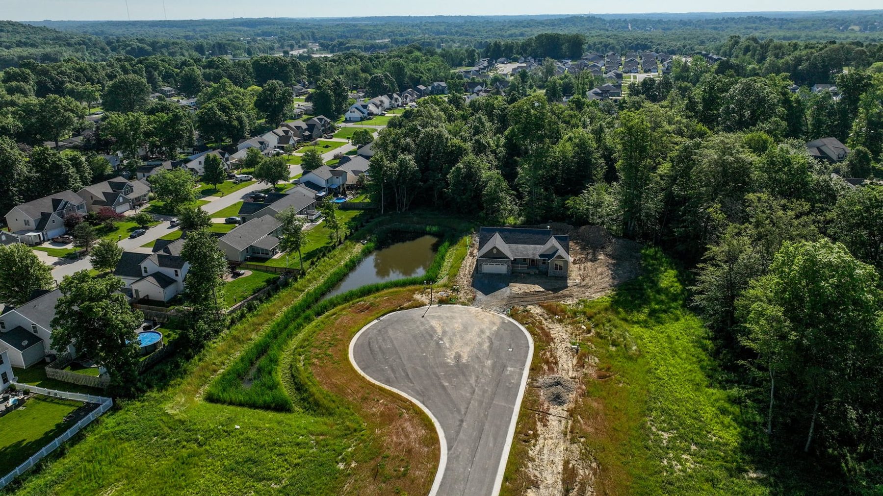 Aerial view of the Willow Run cul-de-sac and pond