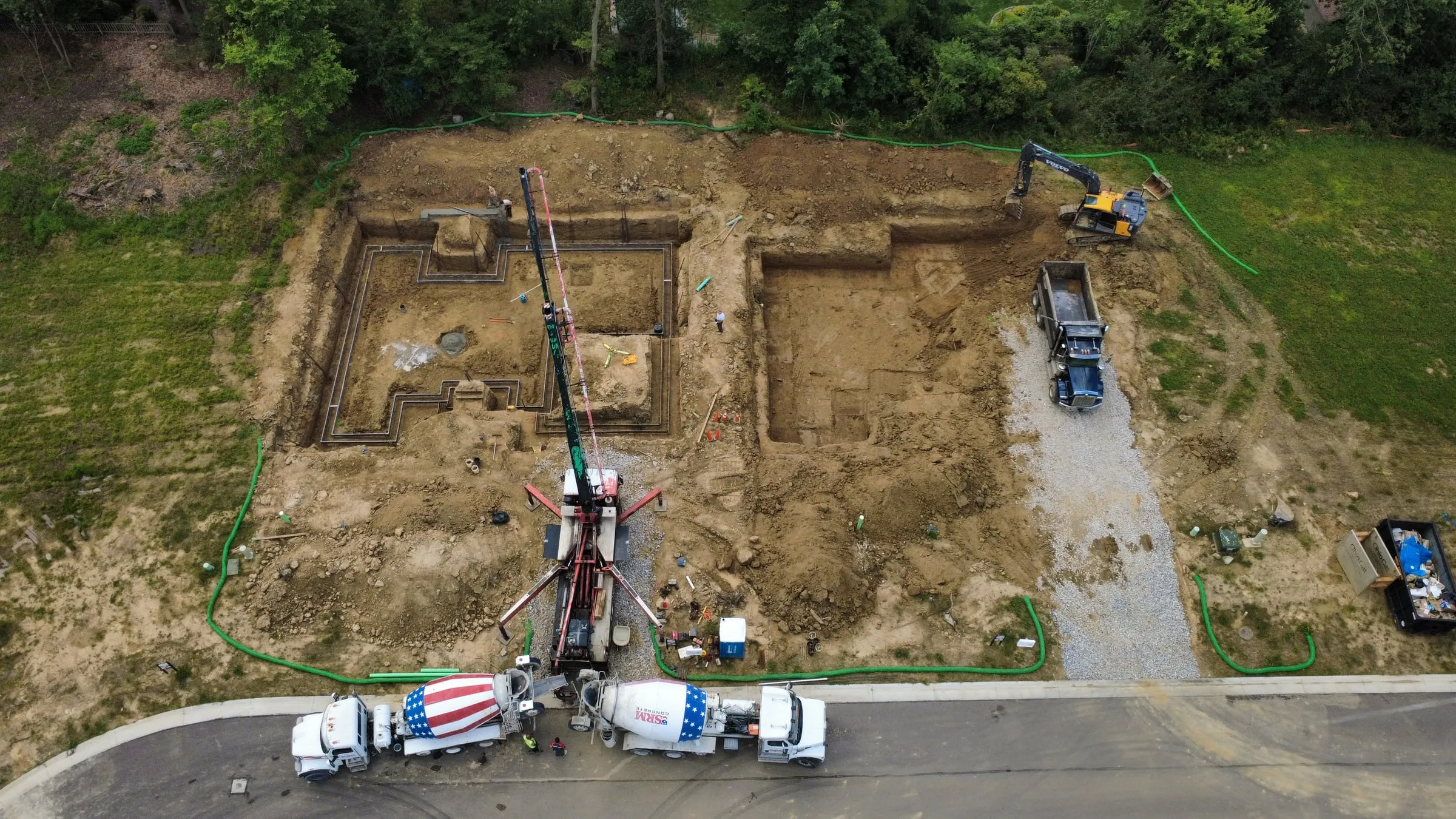 Foundation walls being poured, seen from above