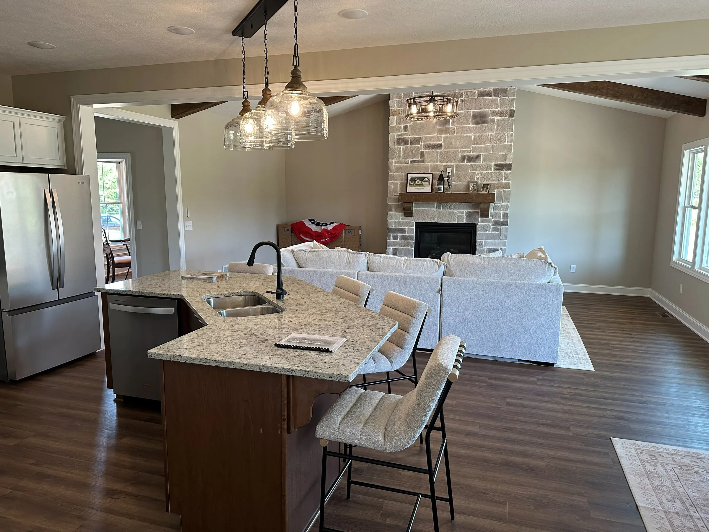 Model home kitchen island open to the great room