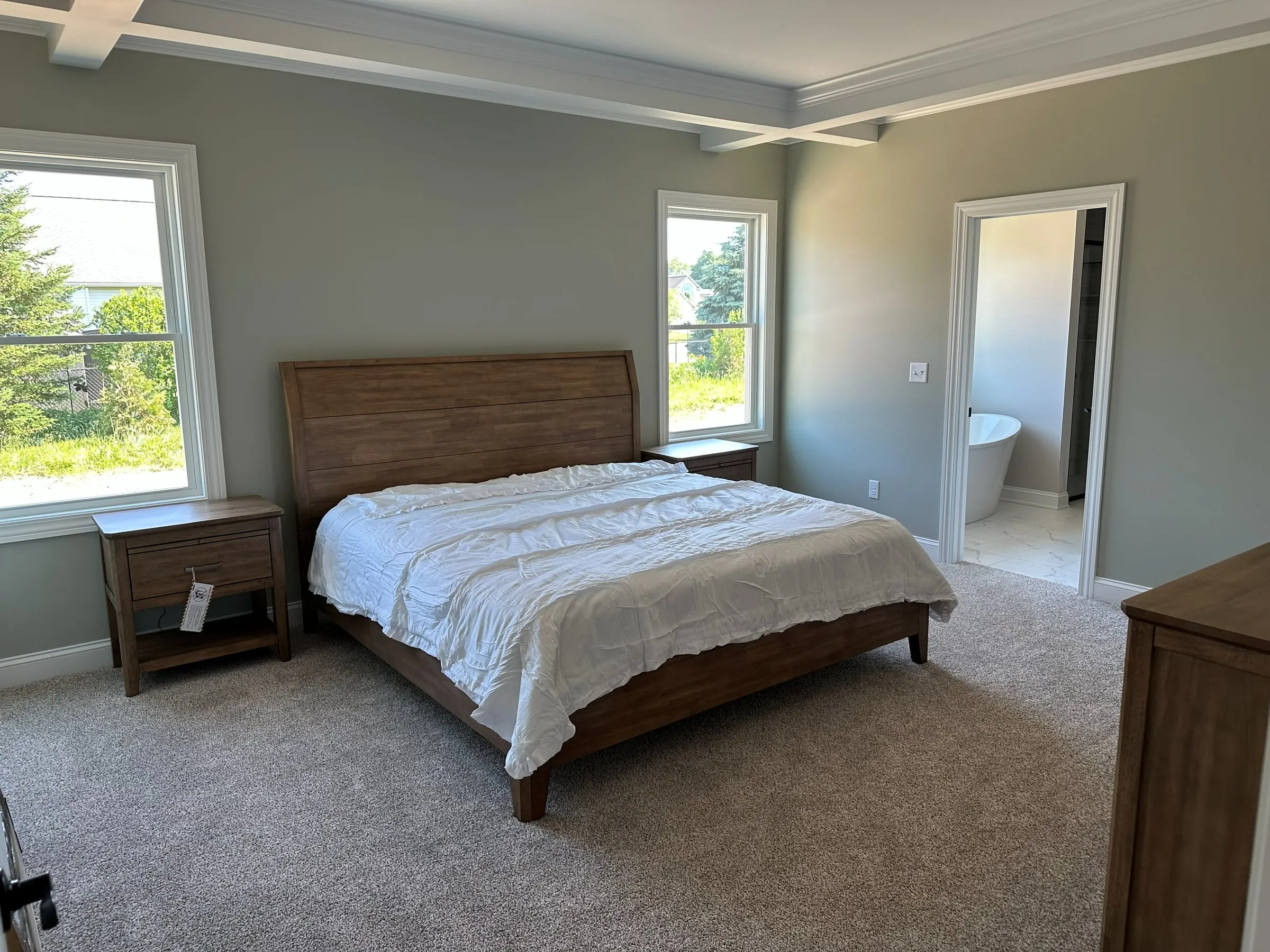 Owner's suite in the model home with the bath beyond